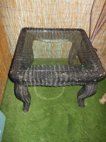 Rattan end table with glass top--- 27"W x 23"H