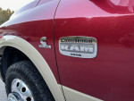 Close-up of 2012 Ram 3500 Mega Cab Laramie Longhorn badge and turbo diesel logo