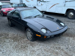 1985 Porsche 928 S V8 project car, non-running with missing interior pieces, located in garage.