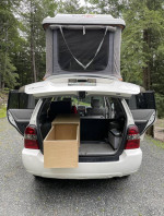 2005 Toyota Highlander Limited with roof tent, spacious interior for camping, and outdoor adventures.