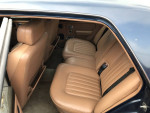 Interior view of a 1990 Bentley Mulsanne S with brown leather seats and classic design.