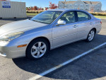 05 Lexus ES 330 in silver color, fully loaded with low mileage, parked in a lot.
