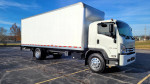 2021 Isuzu FTR box truck with liftgate and low mileage parked outdoors.