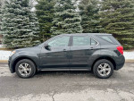 2013 Chevrolet Equinox LS FWD parked in snow, well-maintained, reliable SUV with good gas mileage