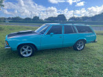 1978 Chevrolet Malibu Custom Wagon in teal and black with new interior, excellent condition, 10,000 miles