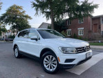 2018 Volkswagen Tiguan S 4Motion SUV in white, excellent condition with 137,000 miles for sale.