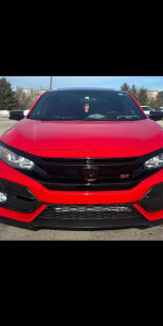 Front view of a red 2017 Honda Civic Si with clean title and low mileage for sale at $3600.