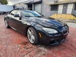 2014 BMW 6 Series 640i convertible in black with light front damage, 74,560 miles, automatic transmission.