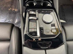 Close-up of BMW 6 Series 640i xDrive center console controls and infotainment system.