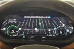 Dashboard display of a 2022 Audi e-tron GT showing navigation and vehicle status.