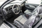 Interior view of a 2001 Chevrolet Monte Carlo LS showcasing leather seats and dashboard features.