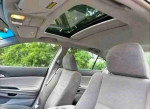 Interior view of a well-maintained 2008 Honda Accord EX with spacious seats and sunroof