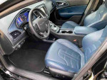 Interior view of a 2016 Chrysler 200S featuring blue leather heated seats and modern dashboard.