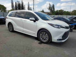 2021 Toyota Highlander Hybrid Platinum in white color, with normal wear and 31,350 miles for sale at $19,300.