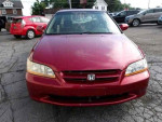 2000 Honda Accord SE in red with 162,414 miles available for $1,400, automatic transmission and beige interior.