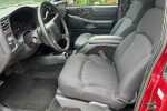 Interior view of a 2003 Chevrolet S-10 LS ZR2 with clean seats and dashboard.