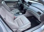 Interior view of a 2012 Honda Accord EX-L V-6 showing leather seats and dashboard features