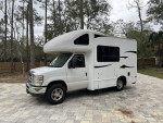 2012 Thor Motor Coach Majestic 19G motorhome parked in a forested area with new paint and upholstery.