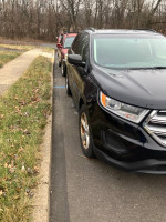 2016 Ford Edge parked on the street, showing signs of wear and needing turbo repairs.