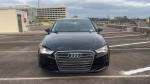 Front view of a black 2015 Audi A3 with 113,000 miles, showcasing clean design and alloy wheels.