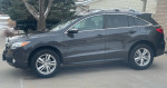 2014 Acura RDX in Graphite Luster Metallic with leather interior, showcasing its sleek design and features.