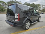 2016 Land Rover LR4 HSE luxury SUV with 56,000 miles, featuring sleek design and 3 sunroofs parked outdoors.