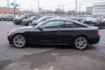 2020 BMW 430i xDrive Coupe in Black Sapphire Metallic, showcasing its sleek design and luxurious features.