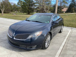 2014 Lincoln MKS for sale, good condition, rebuilt title, smooth driving, no mechanical issues.