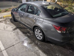 2010 Honda Accord EX showing sleek gray exterior with new tires and clean details in parking lot