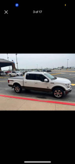 2017 Ford F150 King Ranch Supercab 4x4 parked outside, showcasing its clean design and new off-road tires.