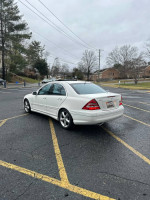 Well-maintained 2006 Mercedes-Benz C230 parked in a lot, featuring a clean exterior and interior.