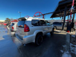 2003 Lexus GX 470 SUV for sale, showing side view at a car wash, clean title, 87,000 miles