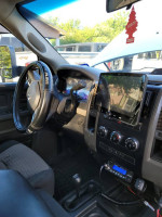 Interior view of a 2011 Dodge Ram 3500 diesel 4x4 truck showcasing the dashboard and controls.