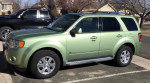 2010 Ford Escape Limited Hybrid in great condition, featuring leather seats and a moon roof.