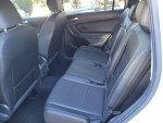 Back seat interior of a 2018 Volkswagen Tiguan SEL with Titan Black Leatherette upholstery.