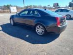 Side view of a well-maintained 2012 Cadillac CTS, showcasing its sleek design and alloy wheels.