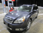2012 Subaru Outback Limited parked at gas station with snow, single owner, excellent condition, warranty until Feb 2025.