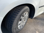 Close-up of a Bridgestone tire on a 2010 Honda Odyssey EX in excellent condition