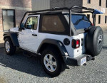 2020 Jeep Wrangler with upgrades, hardtop and soft top, heavy-duty roof rack, and 8.4" radio.