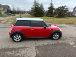 2013 Mini Cooper for sale, 79000 miles, excellent condition, iconic design, compact and fuel-efficient.