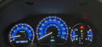 2008 Toyota Sienna XLE dashboard with illuminated gauges showing 158477 mileage and indicator lights