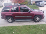 2004 Chevrolet TrailBlazer 4x4 in excellent condition, featuring new tires and no rust, with reliable performance.