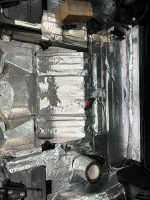 Interior of a 2003 Chevrolet Corvette showing insulated rear deck, clean condition with recently polished surfaces.