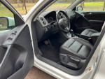 Interior view of a 2016 Volkswagen Tiguan SE showcasing leather seats and dashboard features.