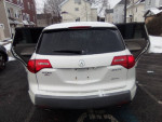 2008 Acura MDX SUV with open tailgate, showcasing spacious interior and 3rd row seating.