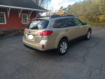 2010 Subaru Legacy Outback in excellent condition, showcasing its stylish design and all-wheel drive features.