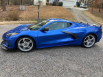 2021 Chevrolet Corvette C8 Z51 in showroom condition, parked on a residential street.