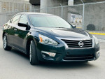 2015 Nissan Altima 2.5 FWD in dark color with clean title, Bluetooth, and detailed body for sale.