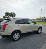 2010 Cadillac SRX luxury edition in excellent condition parked on the street
