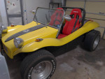 1970 Volkswagen Dune Buggy, yellow, with racing seats and roll bar, needs repairs, not currently running.